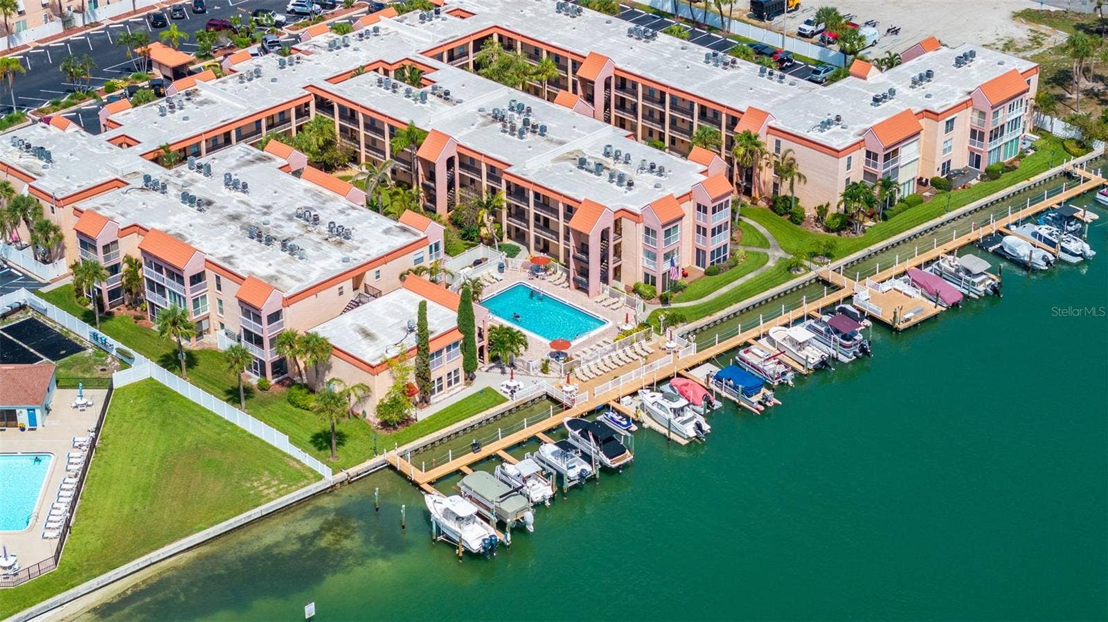 8921 BLIND PASS ROAD, #250, St Pete Beach, FL 33706 aerial view of community and new deck