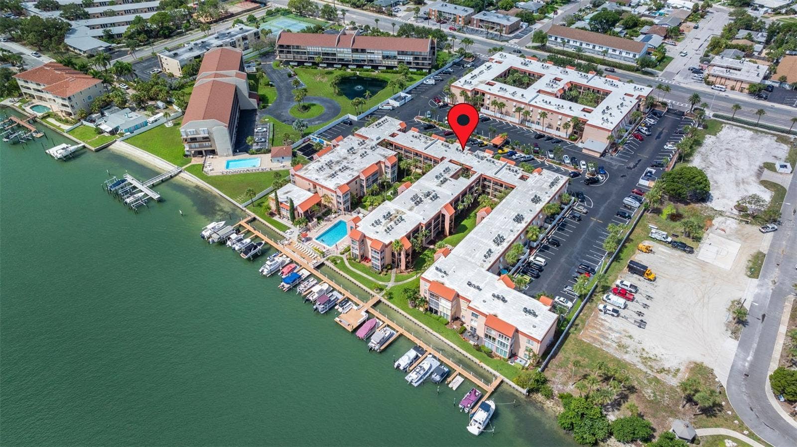 8921 BLIND PASS ROAD, #250, St Pete Beach, FL 33706 aerial view of community and new deck