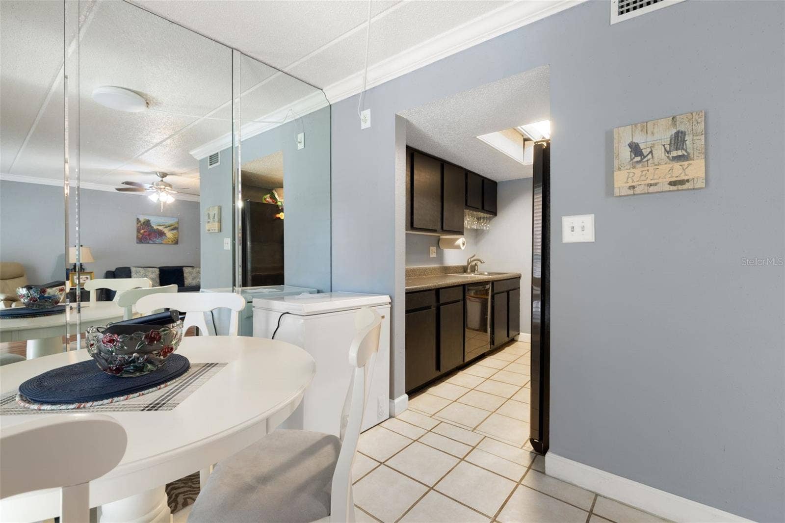 8921 BLIND PASS ROAD, #250, St Pete Beach, FL 33706 Dining room/ kitchen