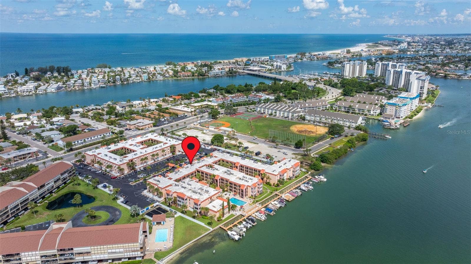 8921 BLIND PASS ROAD, #250, St Pete Beach, FL 33706 aerial view of community and intracoastal waterway