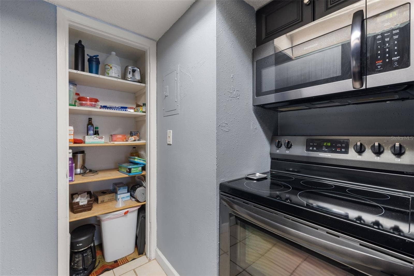 8921 BLIND PASS ROAD, #250, St Pete Beach, FL 33706 kitchen pantry