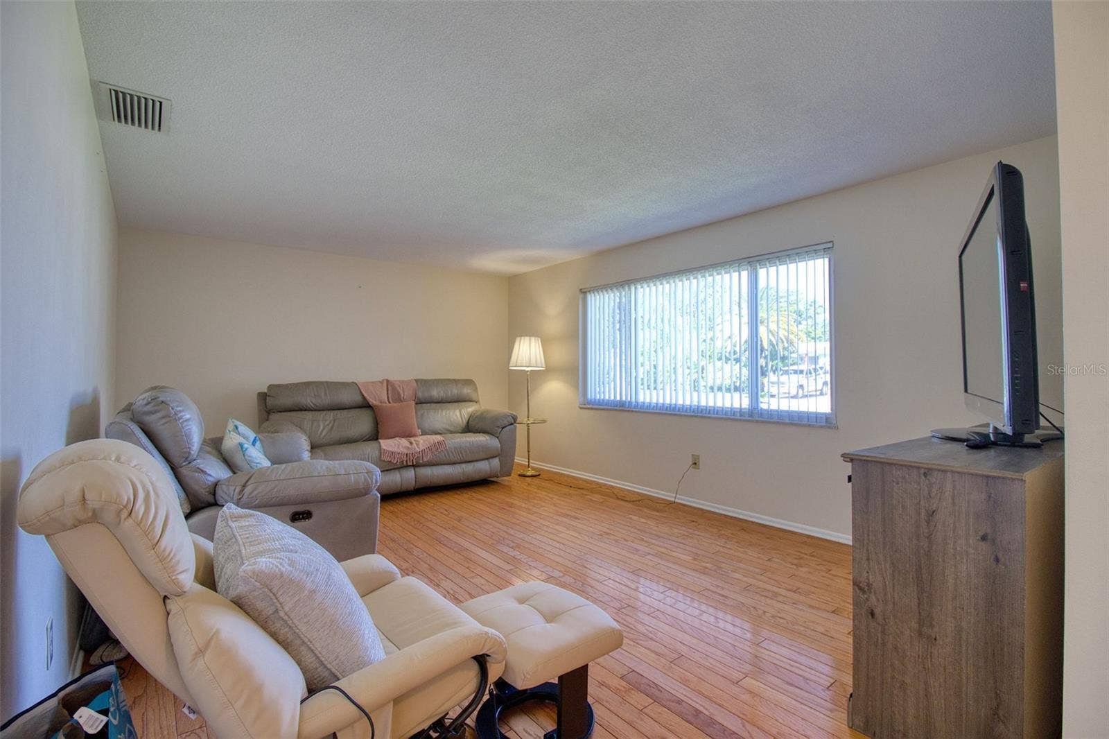 Formal living room opposite formal dining.