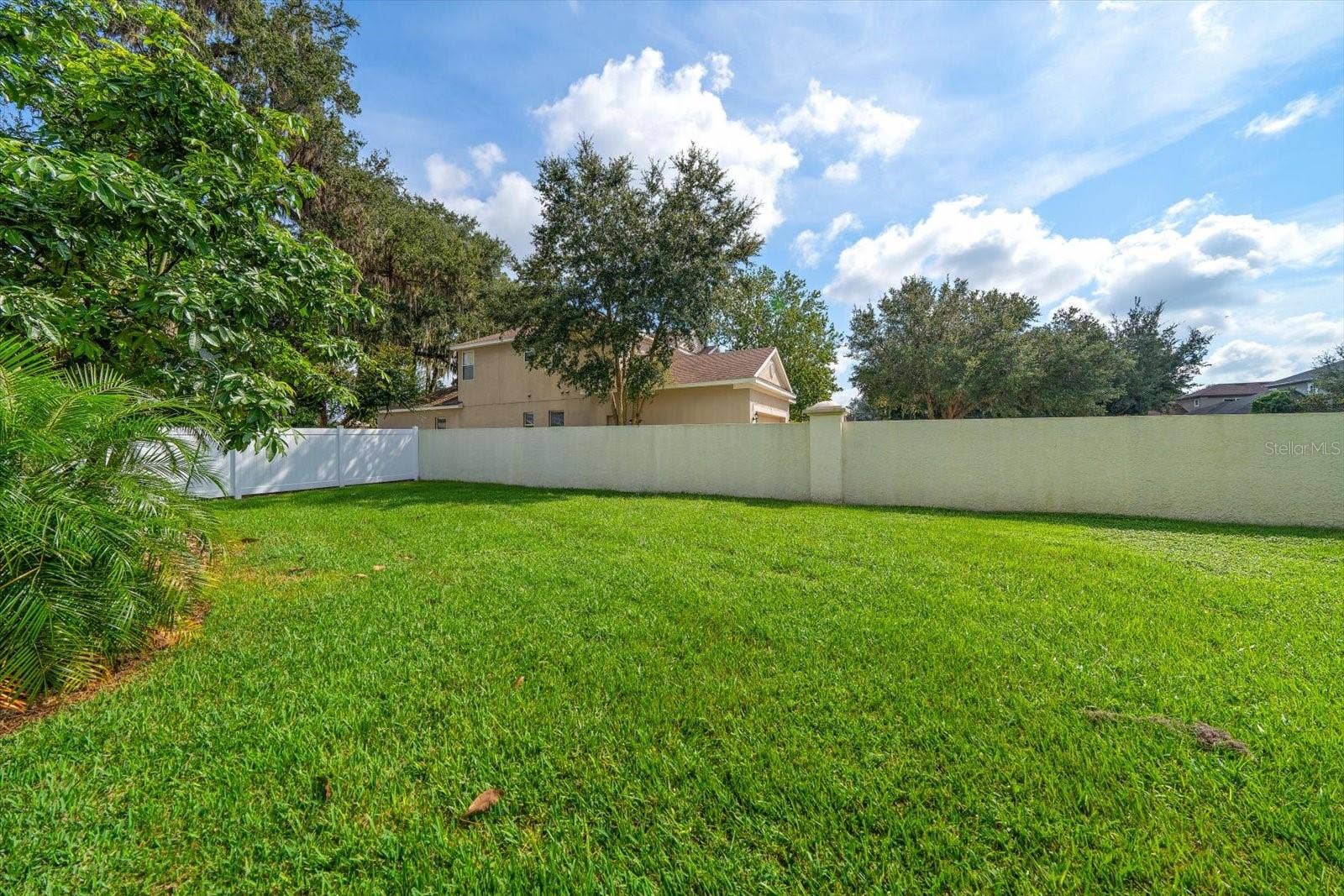 Beautiful oversized lot with programmable  irrigation system.