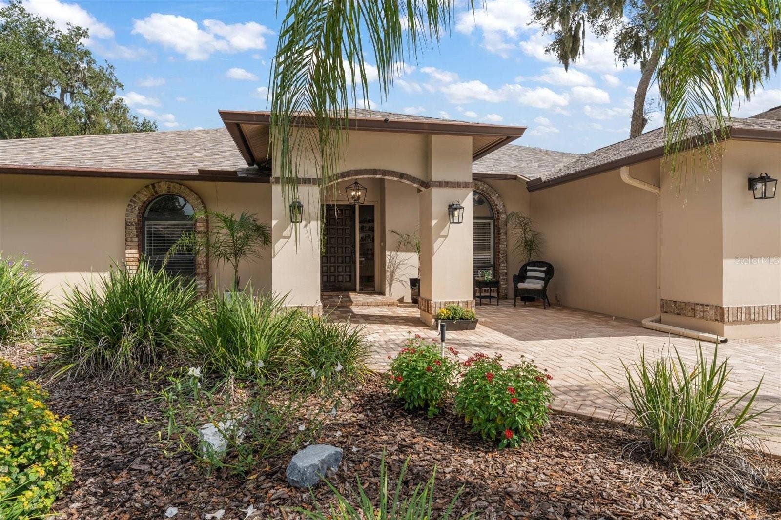 1105 DEER RUN PLACE, Valrico, FL 33594 Paved front courtyard for sunsets and connecting with neighbors.