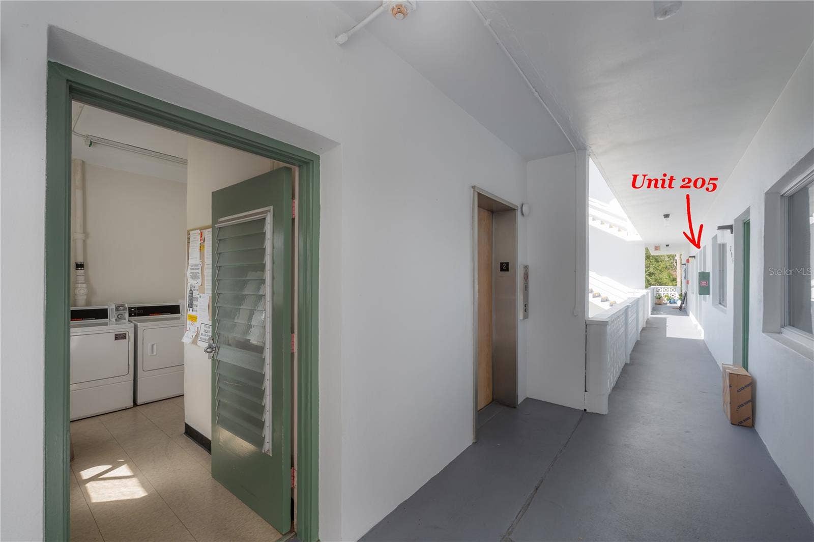 8055 112TH STREET, #205, Seminole, FL 33772 Laundry Room conveniently located next to the elevator