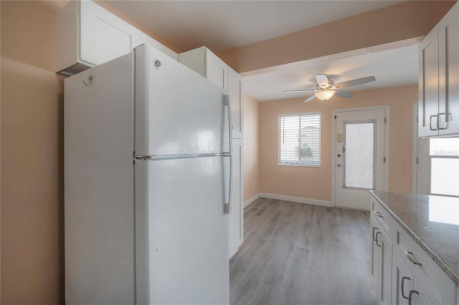 8055 112TH STREET, #205, Seminole, FL 33772 Kitchen facing the dining area