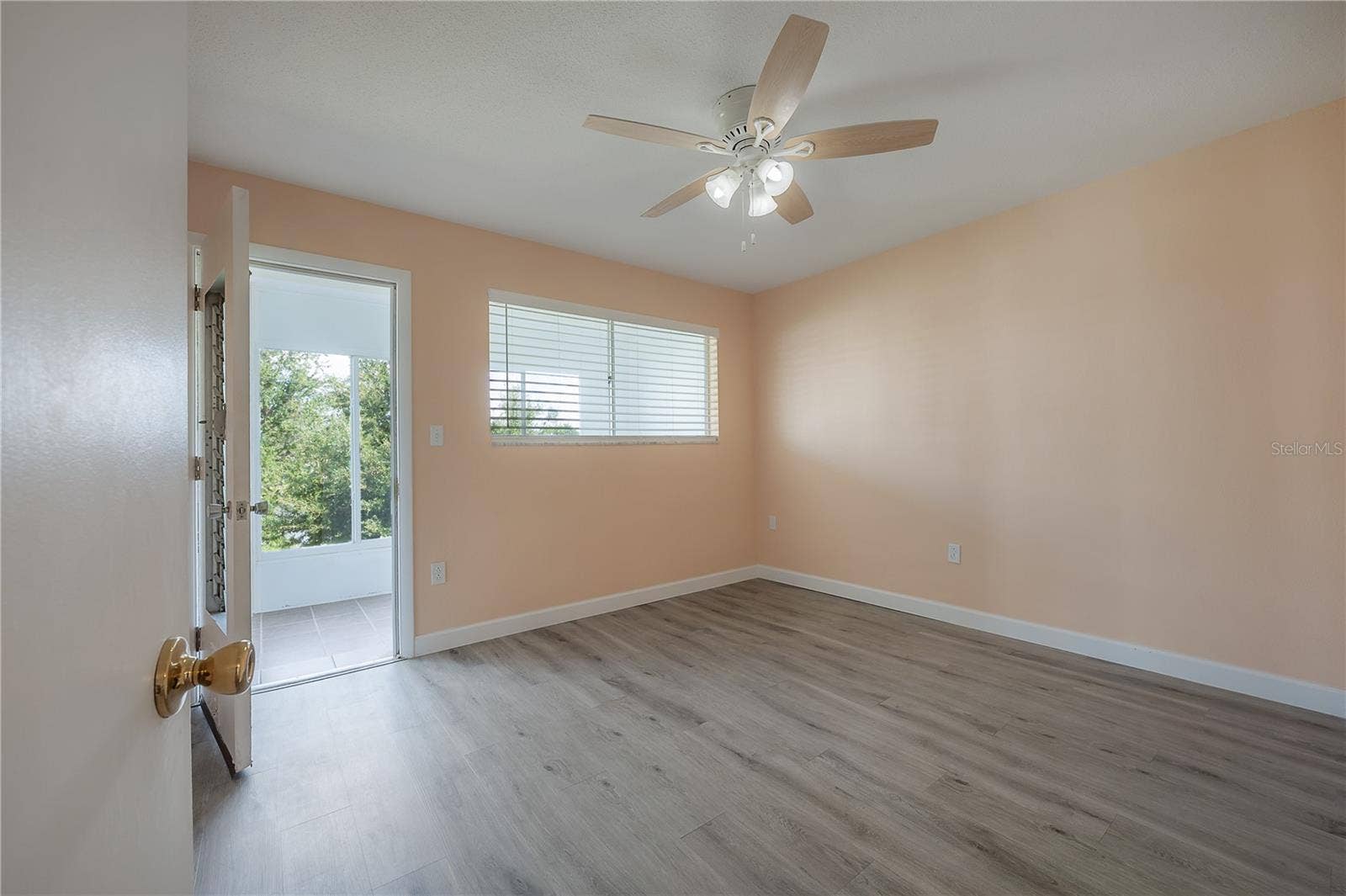 8055 112TH STREET, #205, Seminole, FL 33772 Second Bedroom leading to lanai