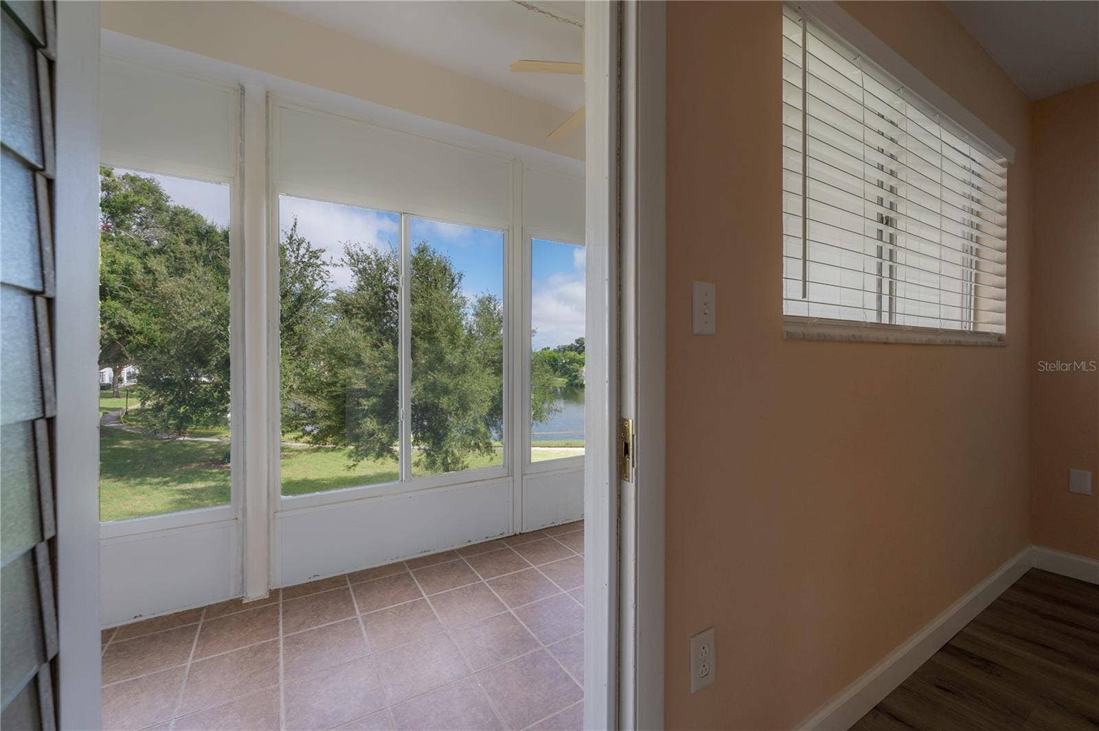 8055 112TH STREET, #205, Seminole, FL 33772 Door leading to the lanai