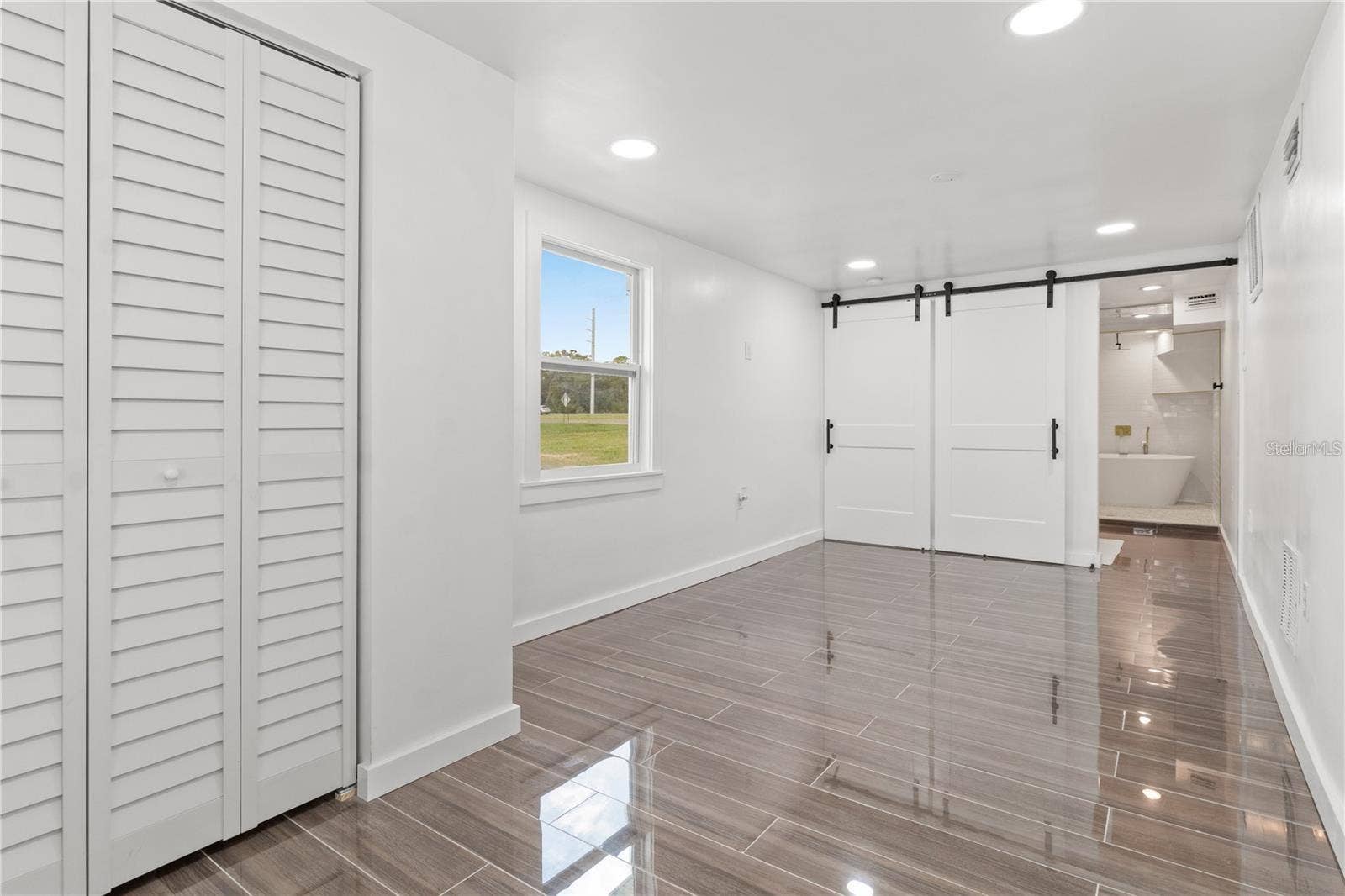 10908 LAND O LAKES BOULEVARD, Land O Lakes, FL 34638 Second primary bedroom, bottom floor