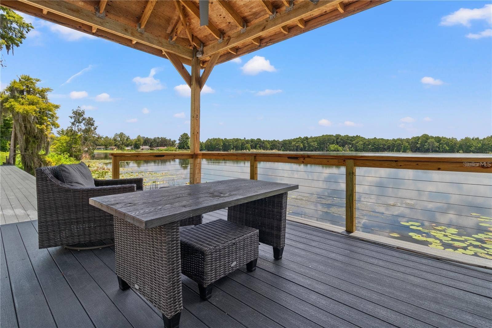 10908 LAND O LAKES BOULEVARD, Land O Lakes, FL 34638 Custom Covered Deck overlooking Green Lake. (Ski and Boating allowed)