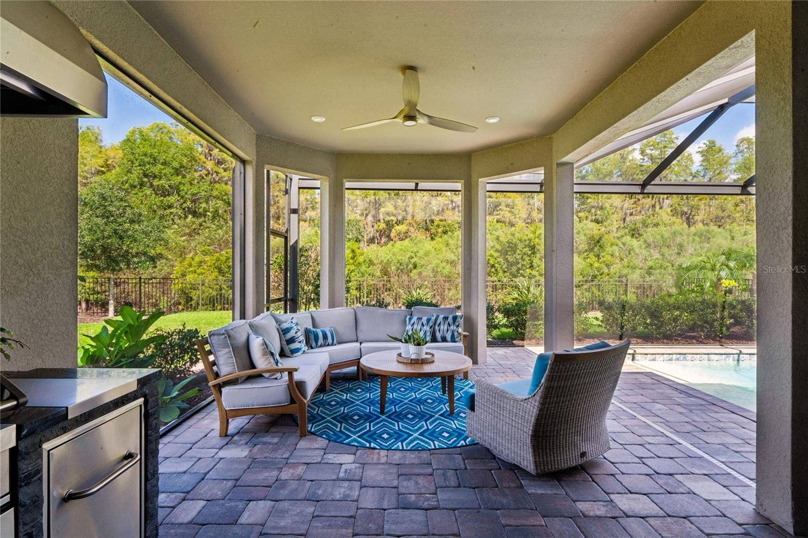 Outdoor covered living space w/ Teak furniture