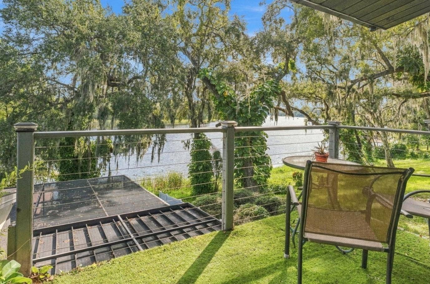 3006 RIVER GROVE DRIVE, Tampa, FL 33610 Balcony off primary with stairs down to pool!
