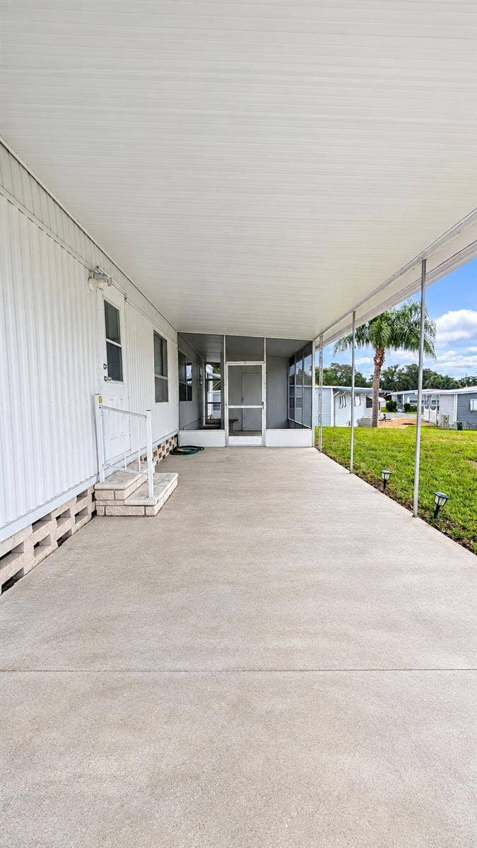 39820 US HIGHWAY 19 N, #181, Tarpon Springs, FL 34689 Carport to Screened Patio
