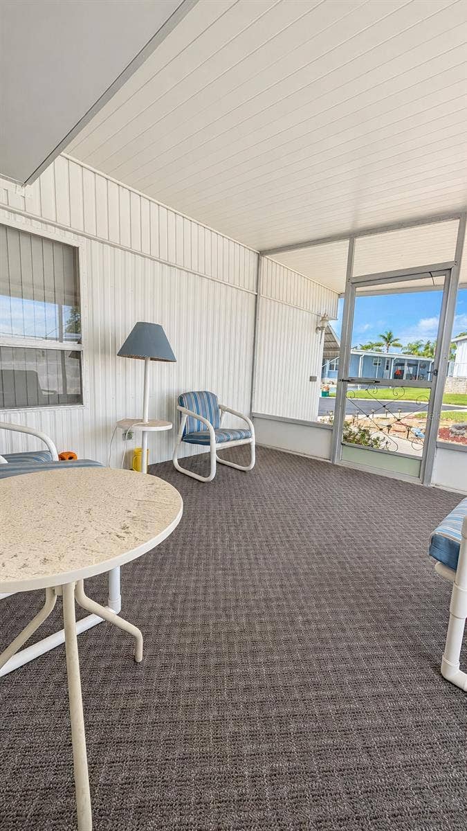 39820 US HIGHWAY 19 N, #181, Tarpon Springs, FL 34689 Front Screened Porch off Living room