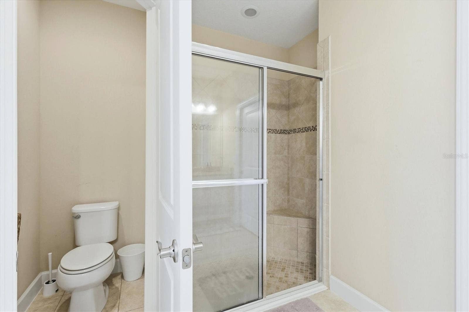 4705 STAFFORD COURT, Palmetto, FL 34221 Pirmary en-suite walk-in glass enclosed shower