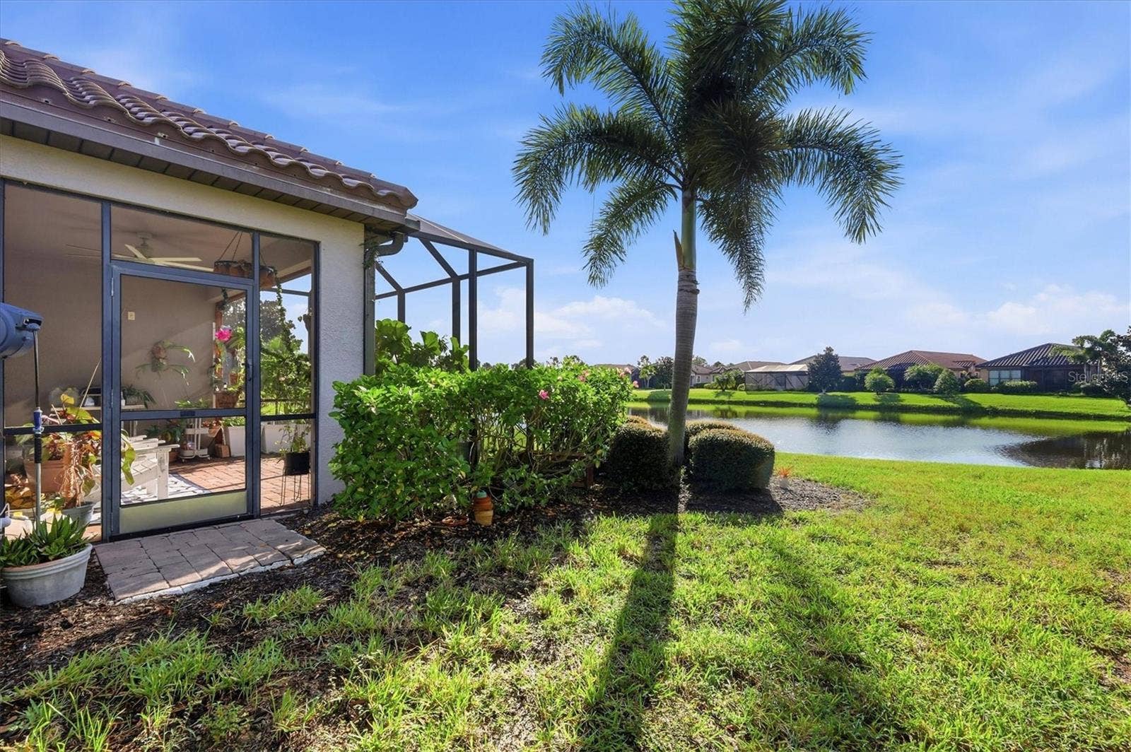 4705 STAFFORD COURT, Palmetto, FL 34221 Corner lot with pond views