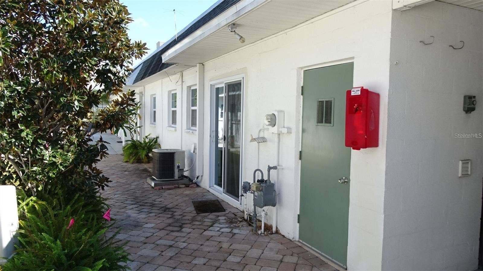7809 38TH TERRACE N, St Petersburg, FL 33709 Rear patio, all pavers, getting pressure washed soon.