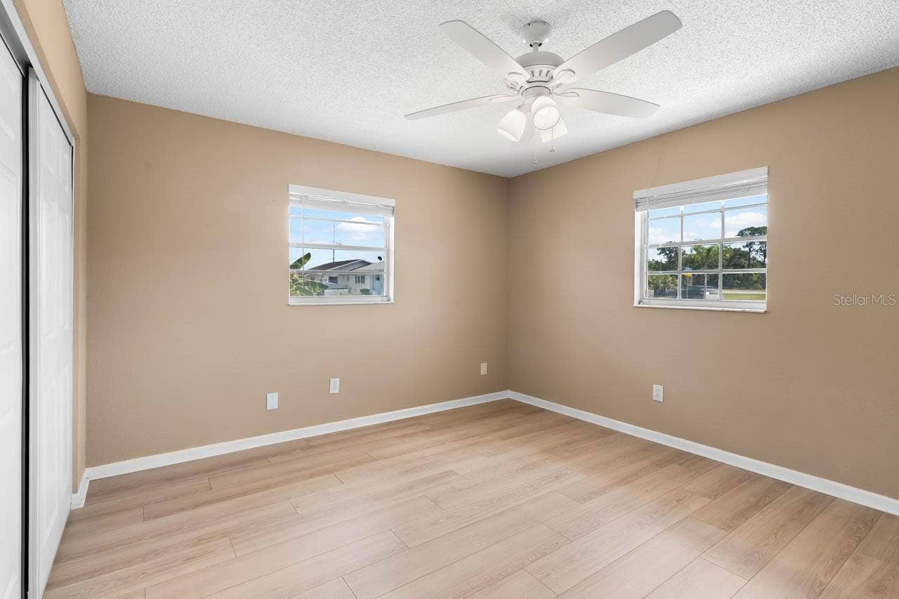701 W BROCKTON PLACE, Sun City Center, FL 33573 Ceiling fan in Guest bedroom