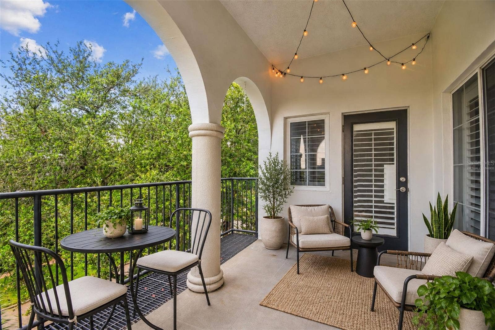 435 S OREGON AVENUE E, #304, Tampa, FL 33606 Virtually staged patio with plenty of room for additional seating.