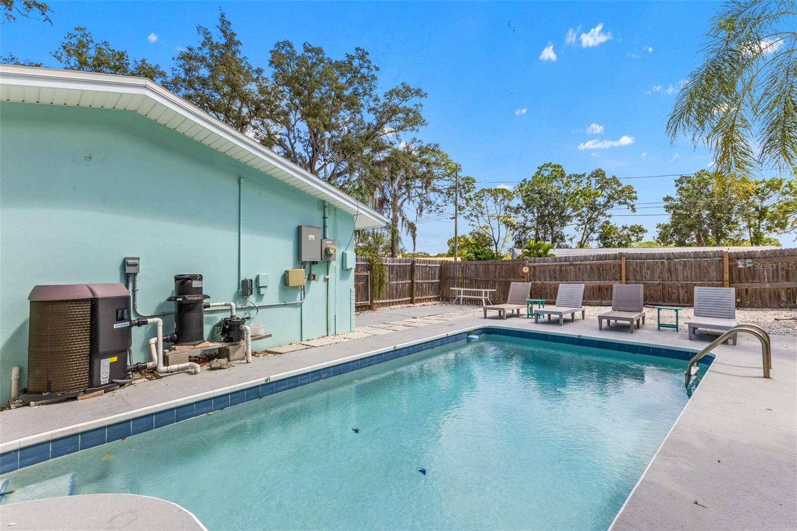 201 SOUTH STREET, Palm Harbor, FL 34683 Heated pool with a new pool pump and heater added in 2025ready for year-round Florida living.