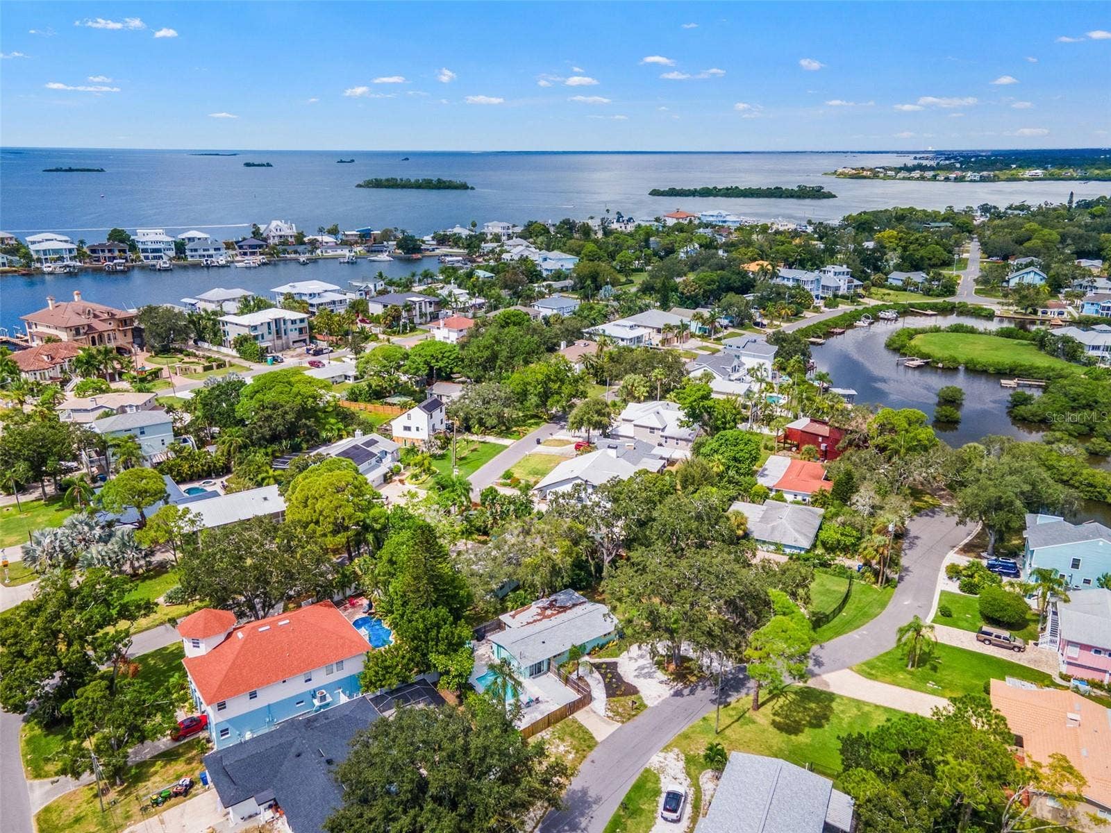 201 SOUTH STREET, Palm Harbor, FL 34683 Sweeping aerial view of Ozona and St. Joseph Soundan incredible location for enjoying the boating, biking, dining, and laid-back coastal lifestyle.