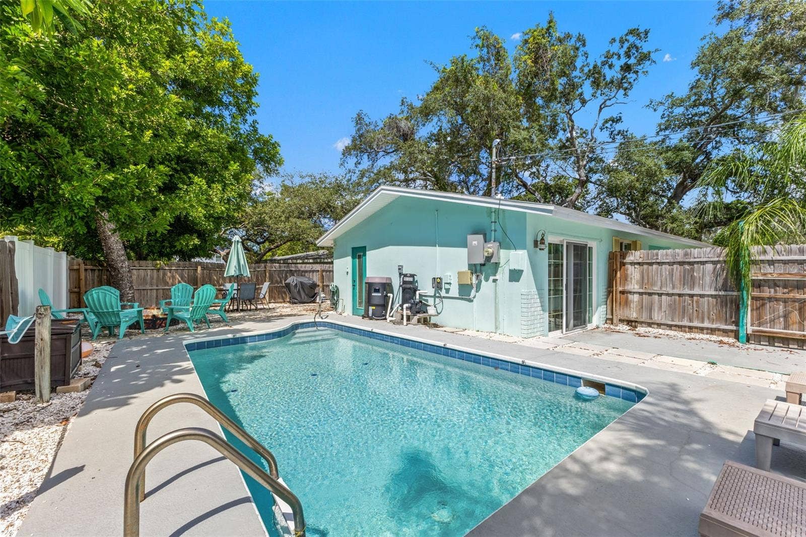 201 SOUTH STREET, Palm Harbor, FL 34683 Another view of the private pool and fully fenced outdoor space, with direct access to the home.