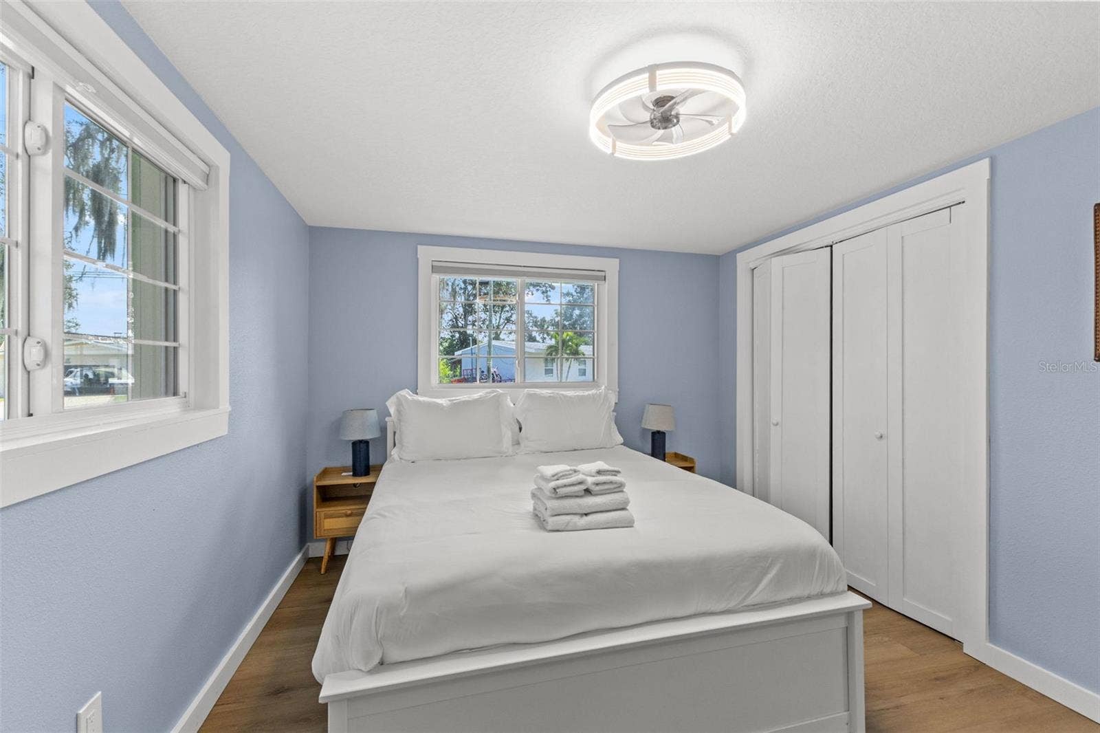 201 SOUTH STREET, Palm Harbor, FL 34683 Another view of the bedroom highlights the natural light, closet storage, and no-carpet flooring.