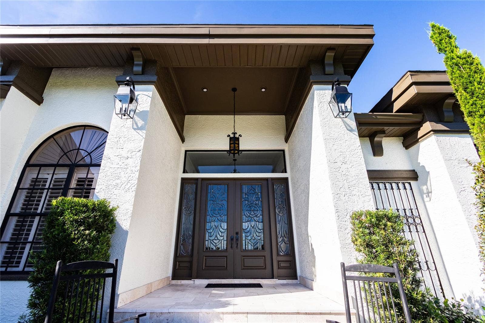 32305 PASCO ROAD, San Antonio, FL 33576 Tall lead beveled double glass doors!