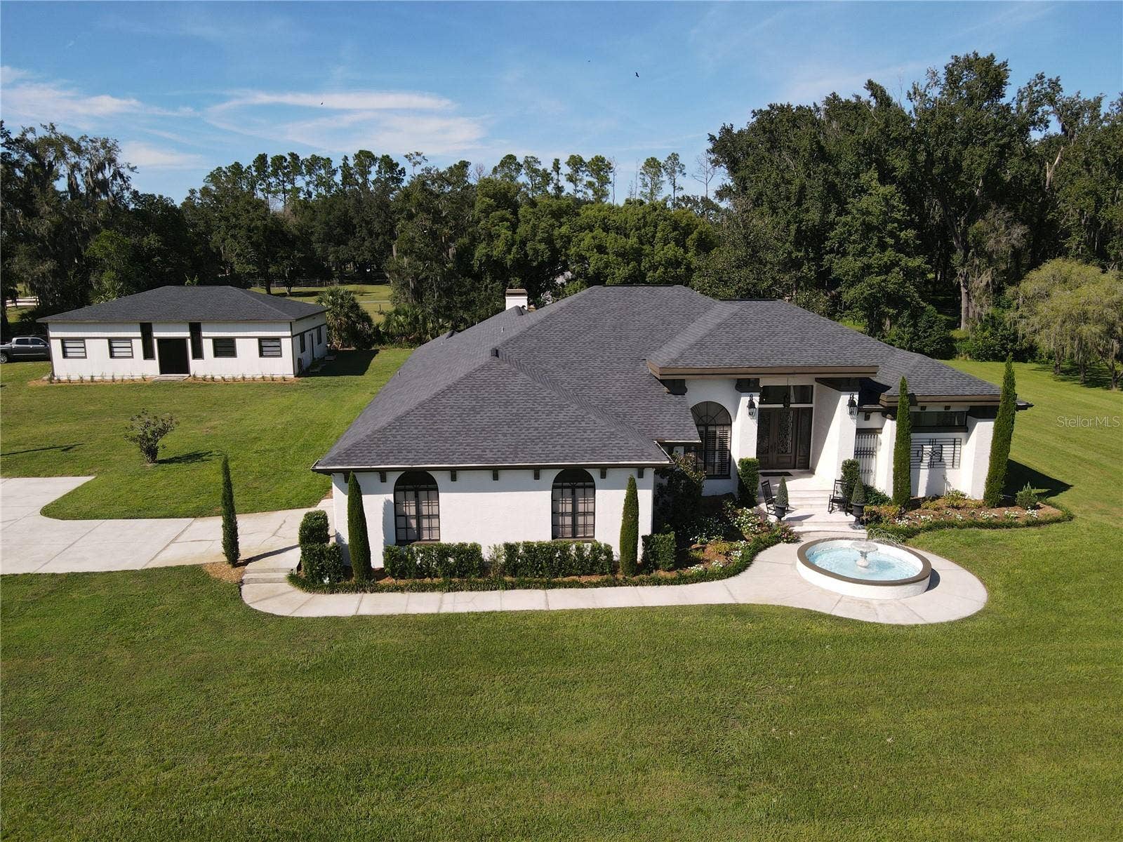 32305 PASCO ROAD, San Antonio, FL 33576 Unique wrought-iron finishes!