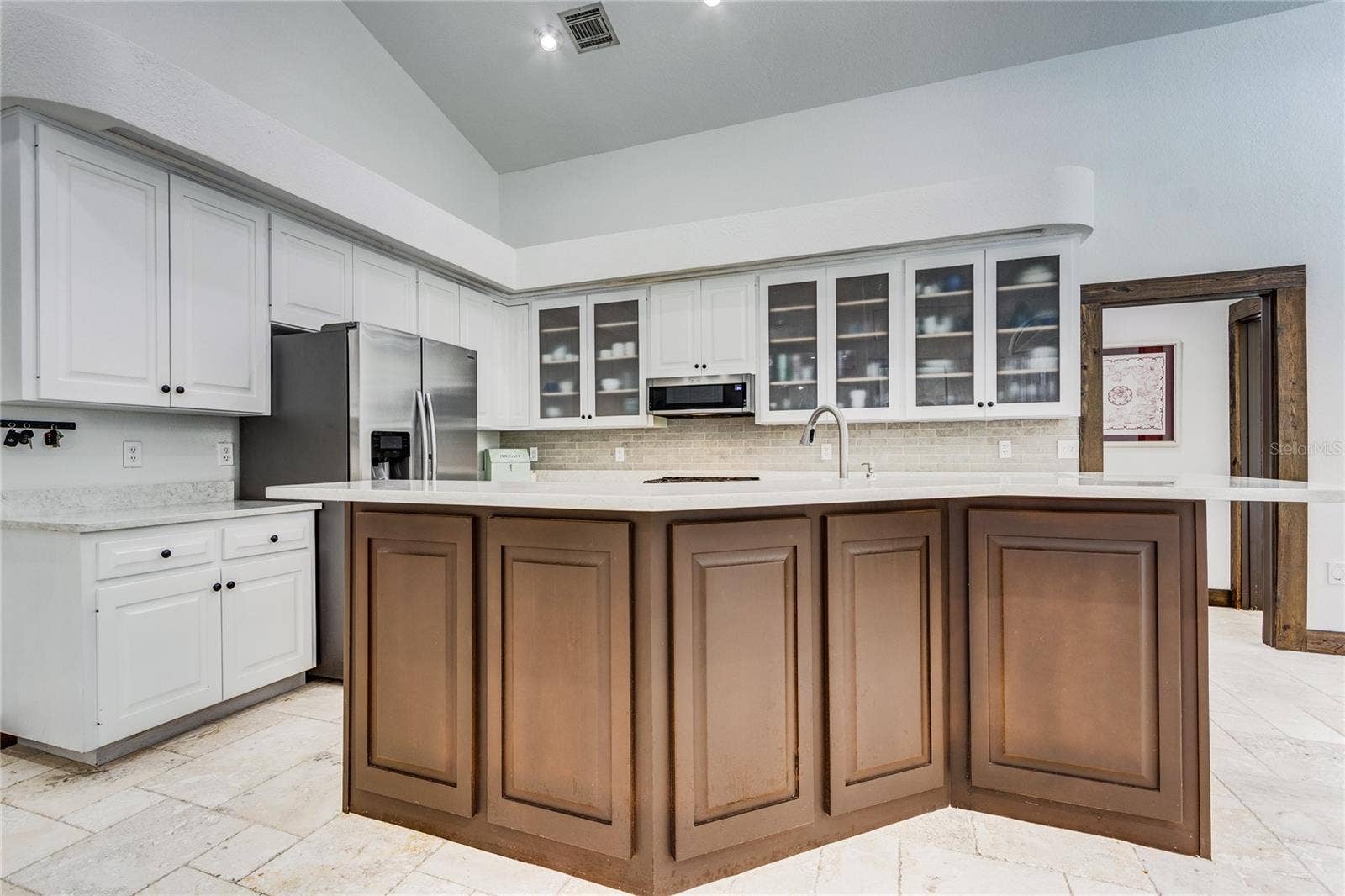 32305 PASCO ROAD, San Antonio, FL 33576 Tons of cabinets and frosted glass features!