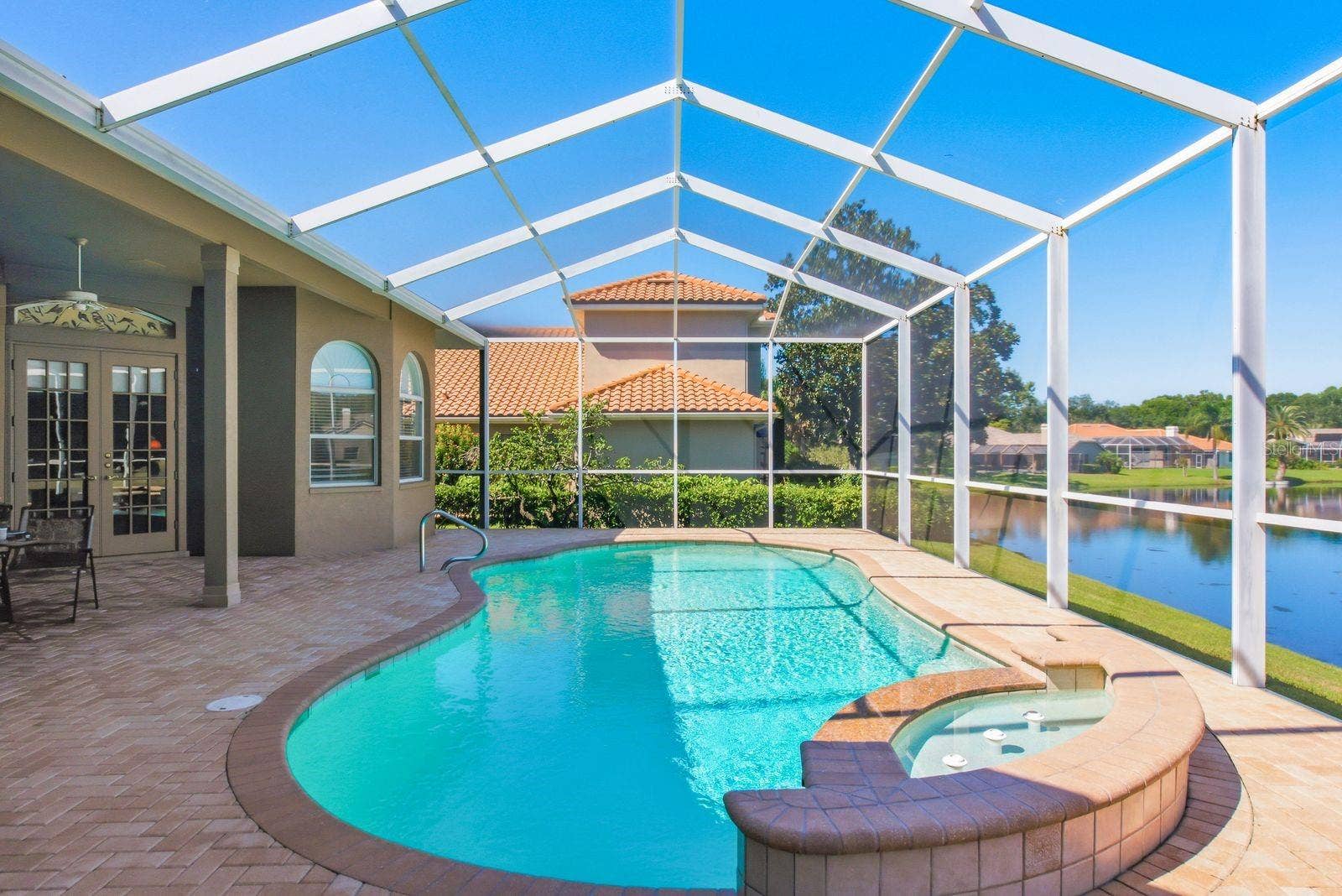 3763 EXECUTIVE DRIVE, Palm Harbor, FL 34685 Pool with fountain on a timer