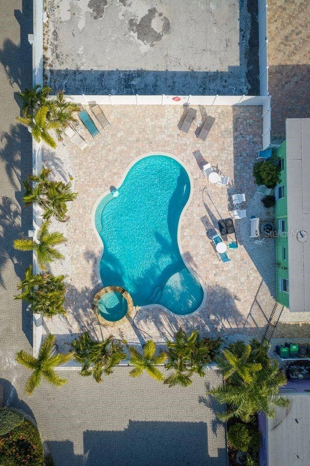 1512 GULF BOULEVARD, Indian Rocks Beach, FL 33785 Aerial view of pool and additional area