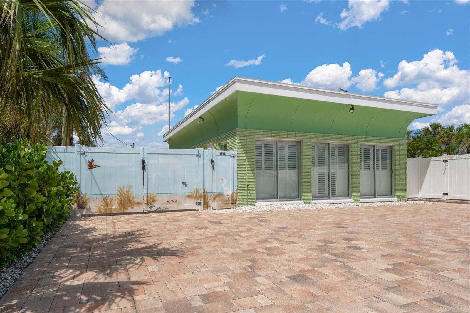 1512 GULF BOULEVARD, Indian Rocks Beach, FL 33785 Front access off of boulevard-delightful hand paintings to enjoy-note the architectural details!