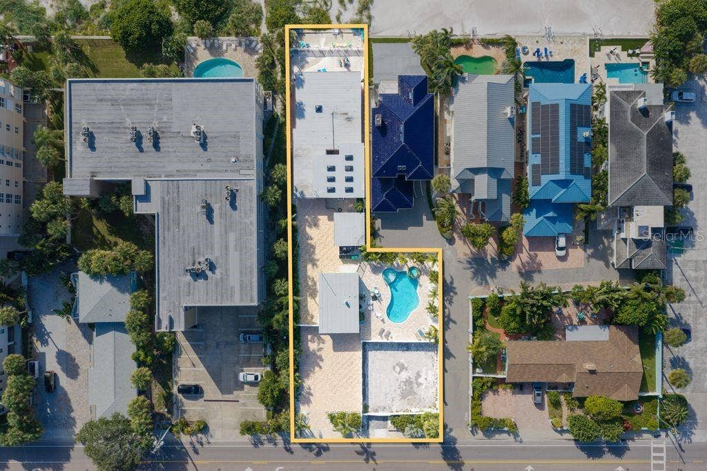 1512 GULF BOULEVARD, Indian Rocks Beach, FL 33785 Perfect family compound providing additional areas to improve such as putting area, tiki hut-let your imagination run!