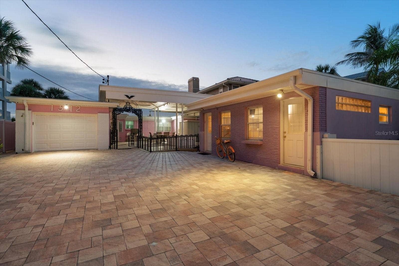 1512 GULF BOULEVARD, Indian Rocks Beach, FL 33785 Plentiful parking, large covered patio, Beach side house of 3 bedrooms, 2 baths, living and family rooms, and 2 separate apartments..did we mention the resort style heated POOL, and separte fenced in yard?