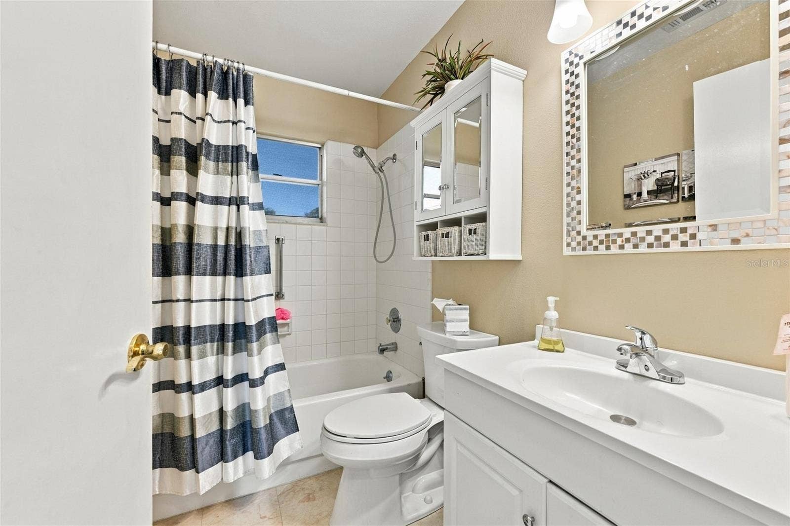 guest bathroom is clean, bright and ready for guests.