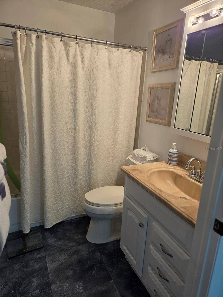 5969 TERRACE PARK DRIVE N, #305, St Petersburg, FL 33709 Guest bathroom with tub