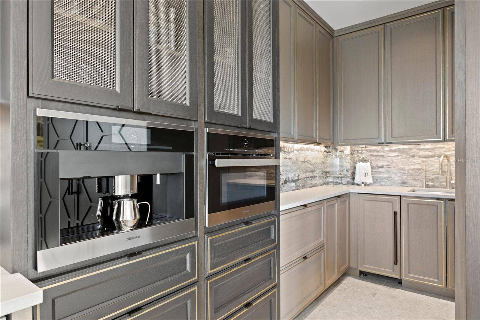 The possibilities are endless with a Miele quick cook over and Miele coffee machine leading into the catering prep center