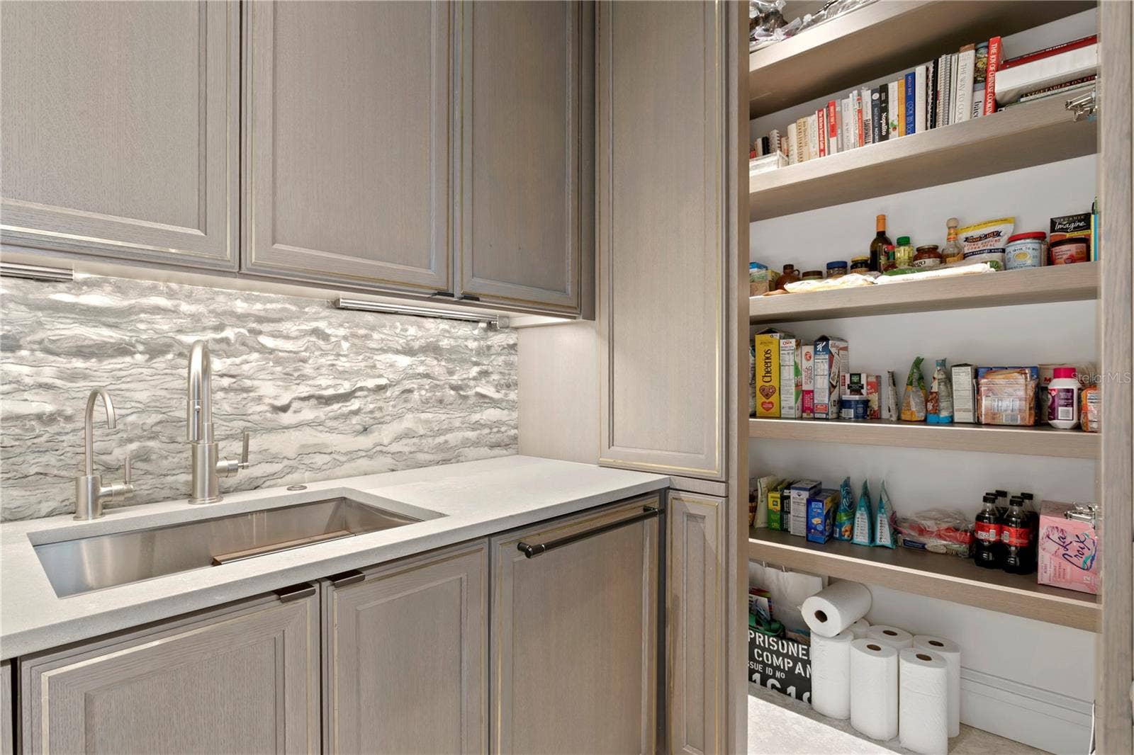 Spacious hidden walk-in pantry