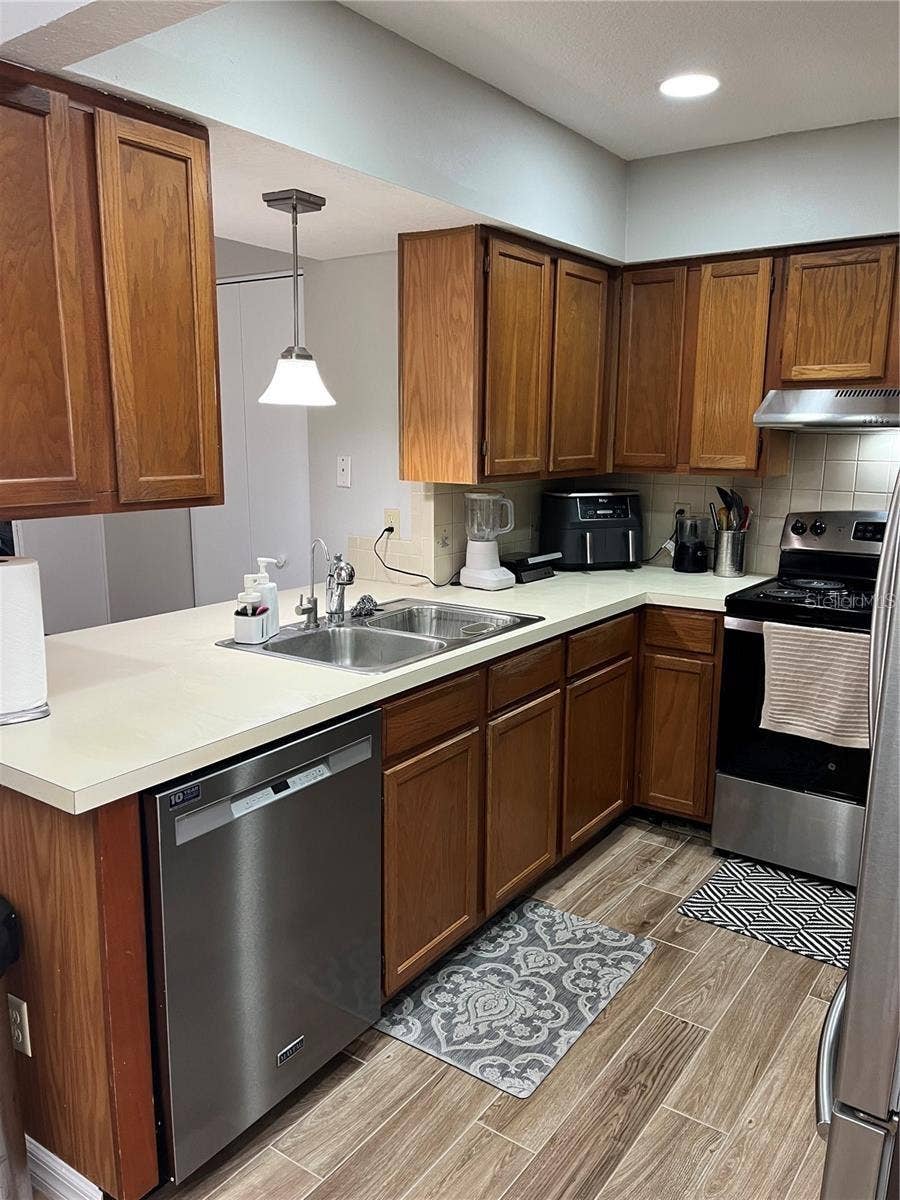 4114 WOODLARK DRIVE, Tampa, FL 33624 4114 WOODLARK DRIVE, Tampa, FL 33624