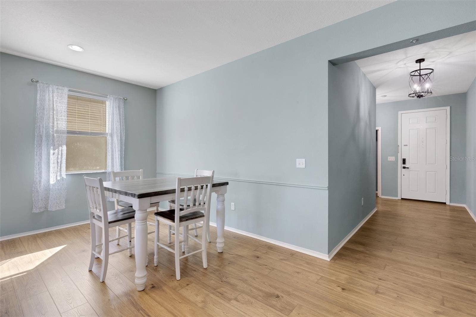 Dining Room & Hallway to Foyer/Front Entryway