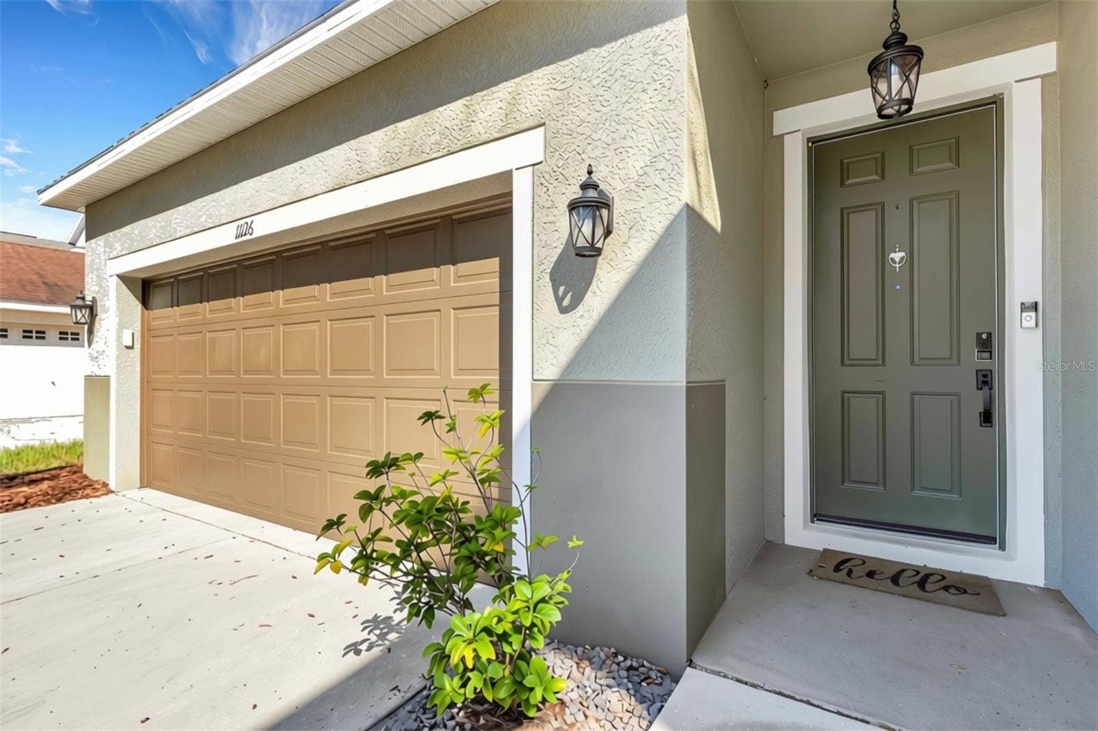 Inviting Front Entry to  11126 Goldenrod Fern Dr