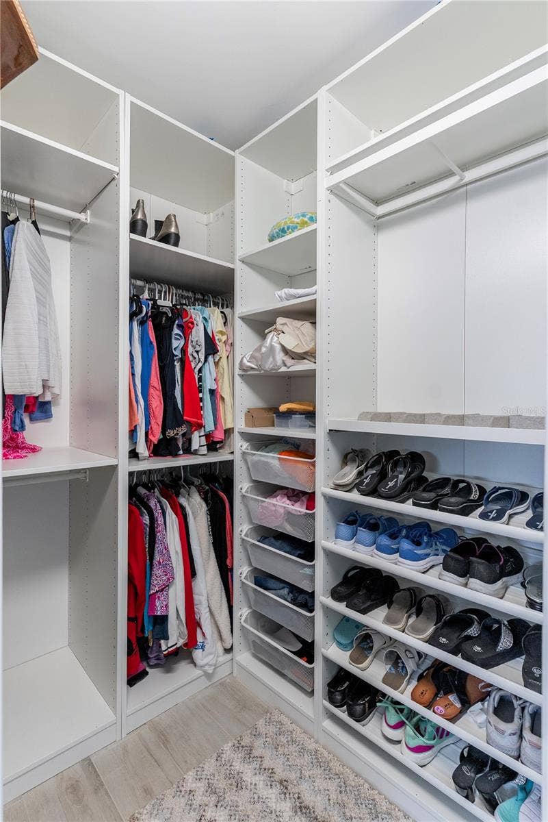 404 HARBOR DRIVE S, Indian Rocks Beach, FL 33785 Primary Suite Walk-in Closet
