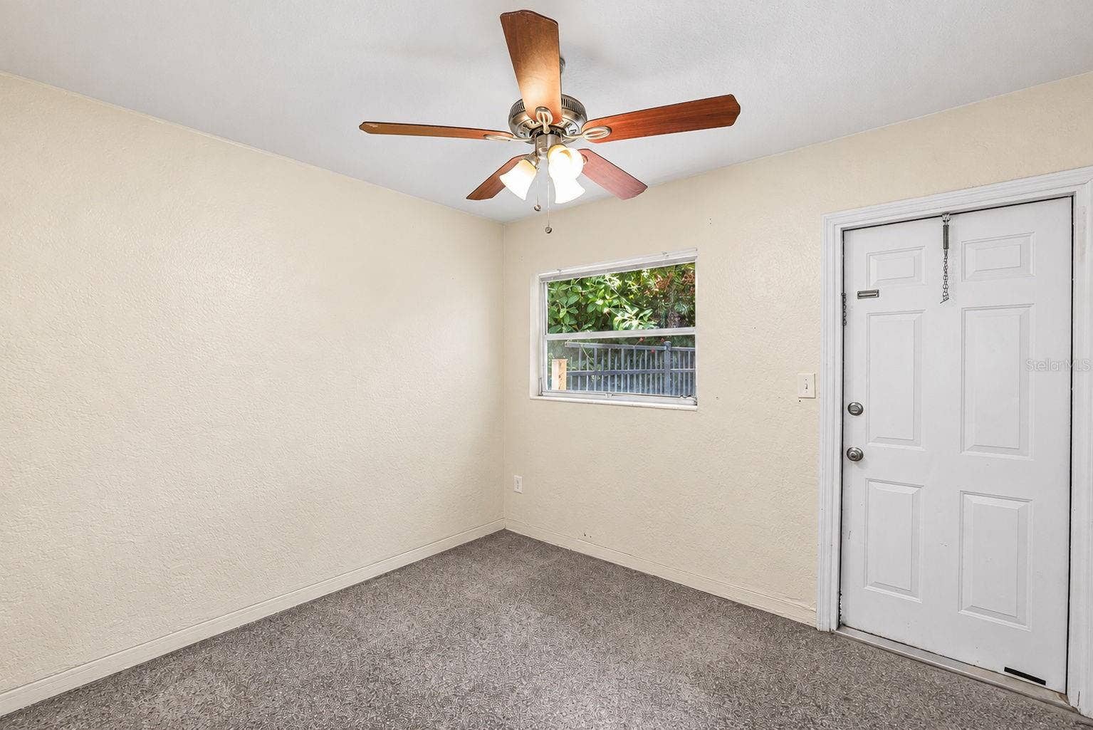 173 38TH AVENUE SE, St Petersburg, FL 33705 UNit 2 - Bedroom 2 - w Door to Backyard