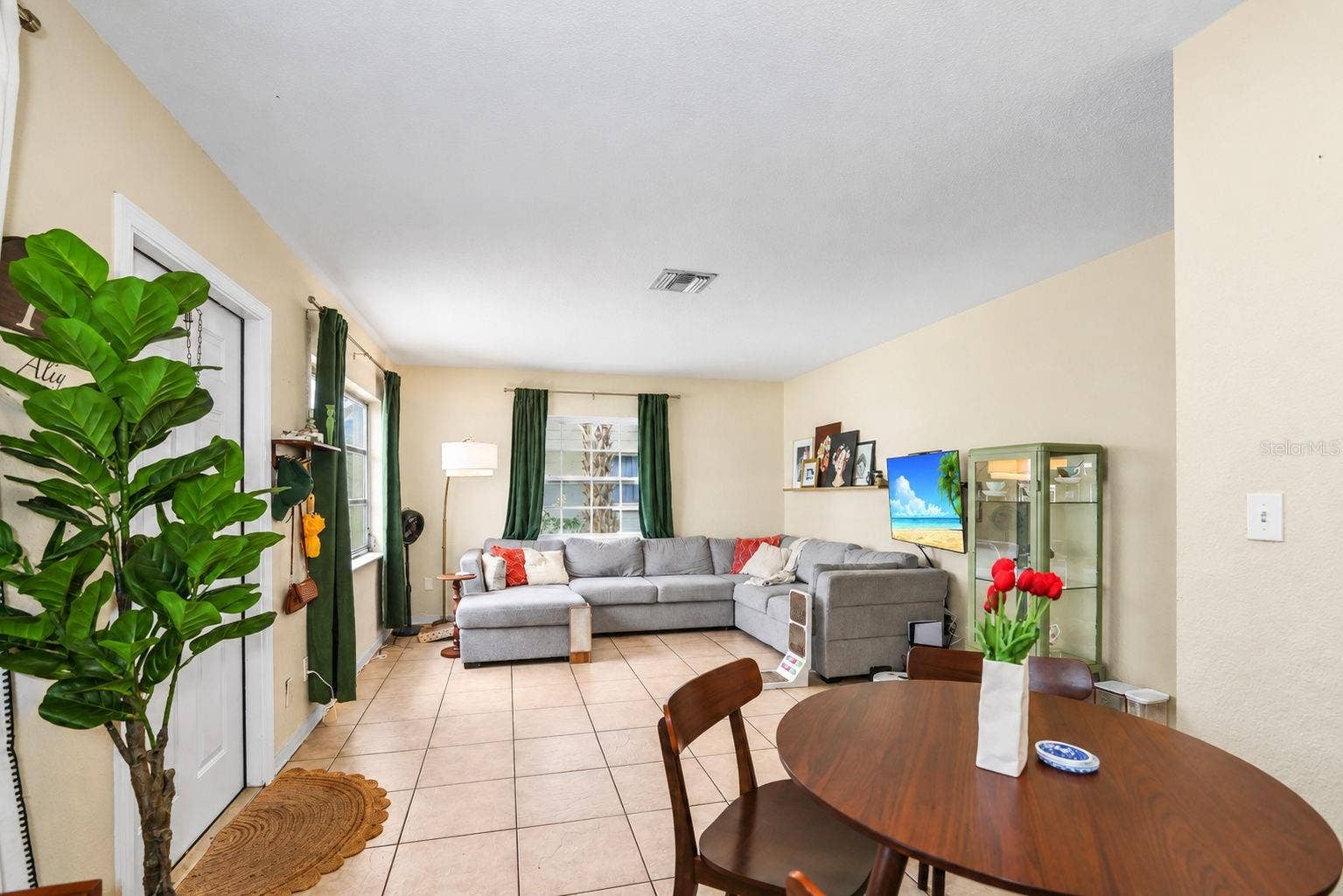 173 38TH AVENUE SE, St Petersburg, FL 33705 Unit 1 - Dining Room to Living Room