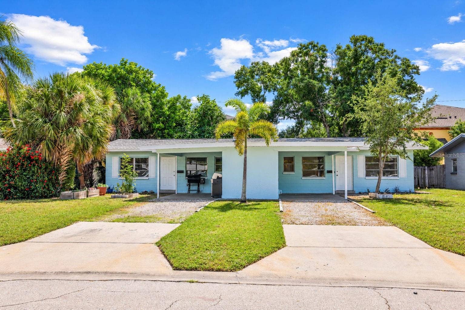 173 38TH AVENUE SE, St Petersburg, FL 33705 Separate Laundry Rooms are inside middle of building between driveways