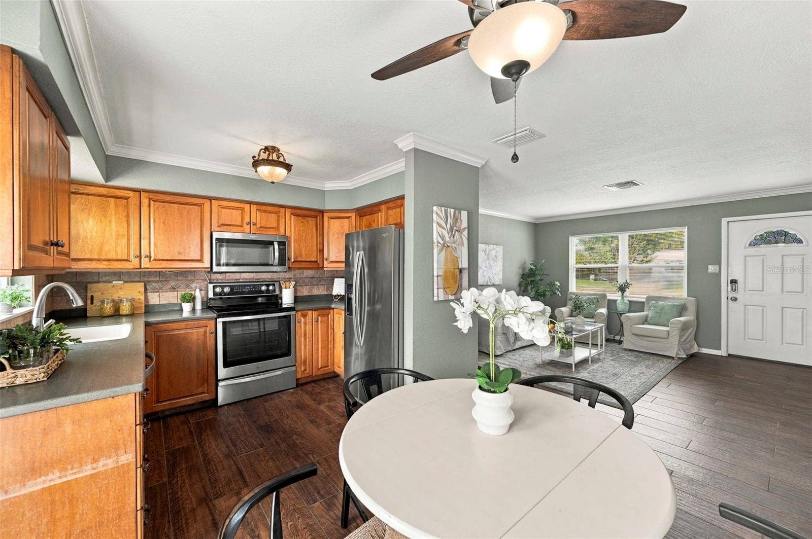 Solid wood cabinets and stainless steel appliances in the Kitchen