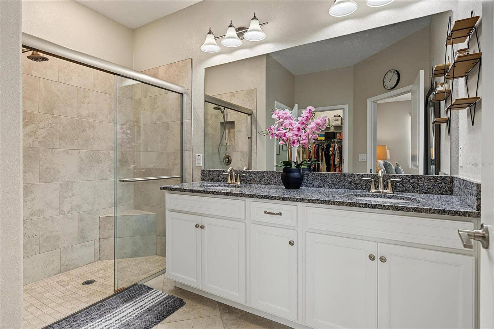 dual sinks, large walk-in shower