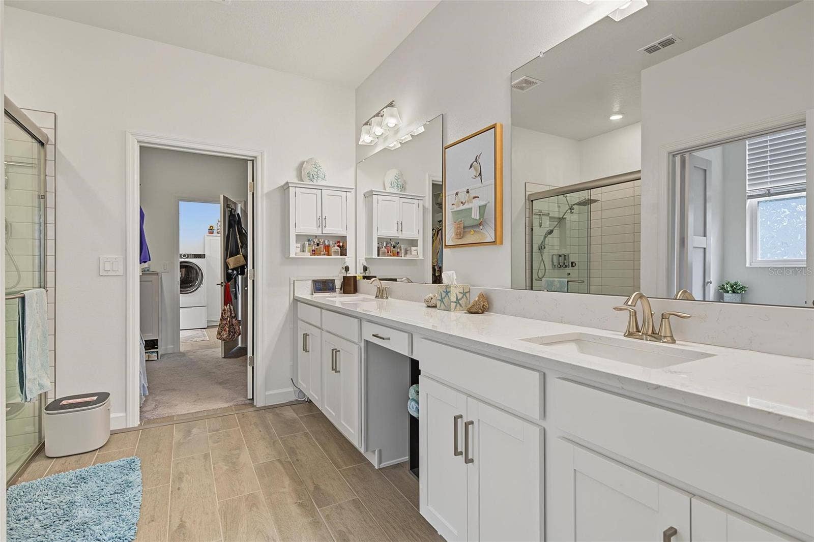 So convienent! Bath opens to closet & laundry room
