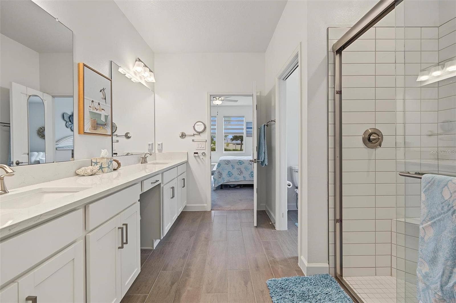 dual sinks, large walk-in shower